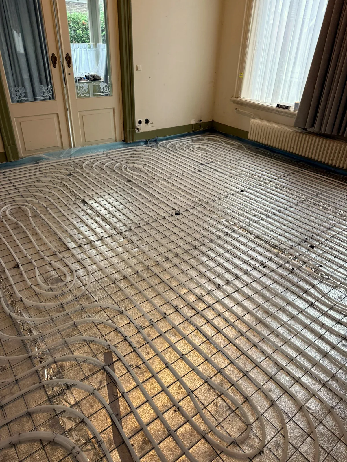 Natte vloerverwarming in dekvloer, SDBouw Groot-Amsterdam